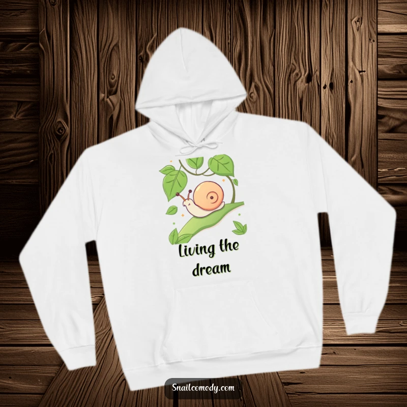 Funny warm hoodie featuring a kawaii snail sliding down a leafy slope with an expression of pure glee.