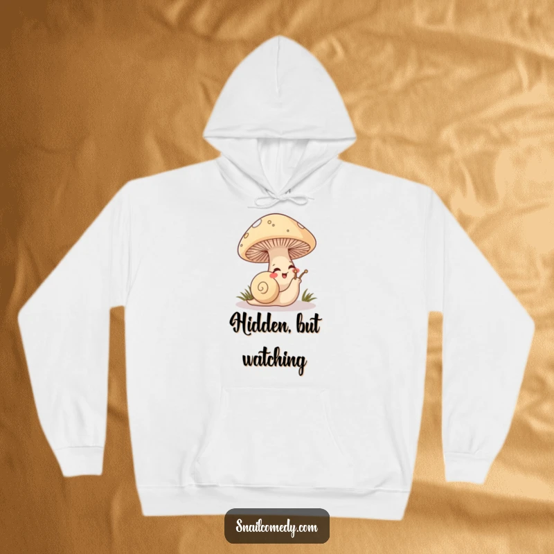 Funny Snail Hoodie featuring a mischievous snail peeking from under a mushroom, perfect for cozy, playful wear.