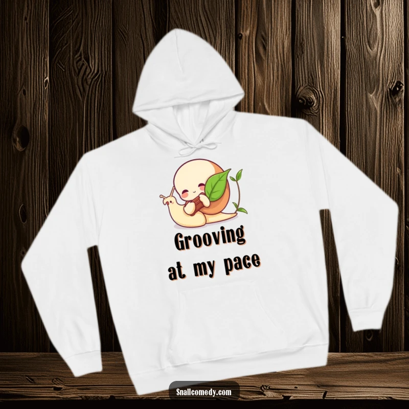 Funny snail hoodie featuring a snail playing a leaf like a miniature musical instrument, warm and charming attire.