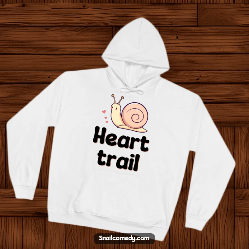 Funny Kawaii snail hoodie featuring a cute snail leaving a trail of little hearts as it moves, designed for comfort and love.