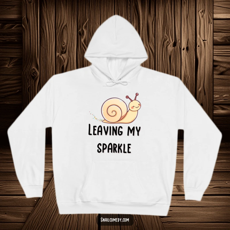 Cute kawaii snail leaving a shimmering glitter trail on a warm and cozy hoodie.