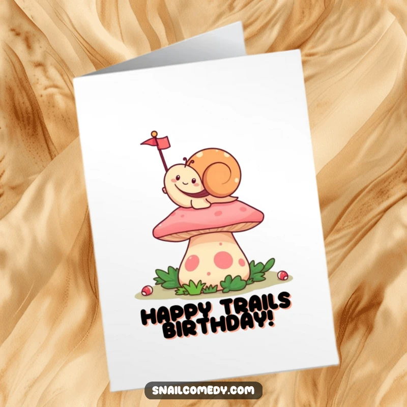 Funny Free Printable Birthday Card with a happy Kawaii snail cheerfully waving a small flag from a colorful mushroom top.