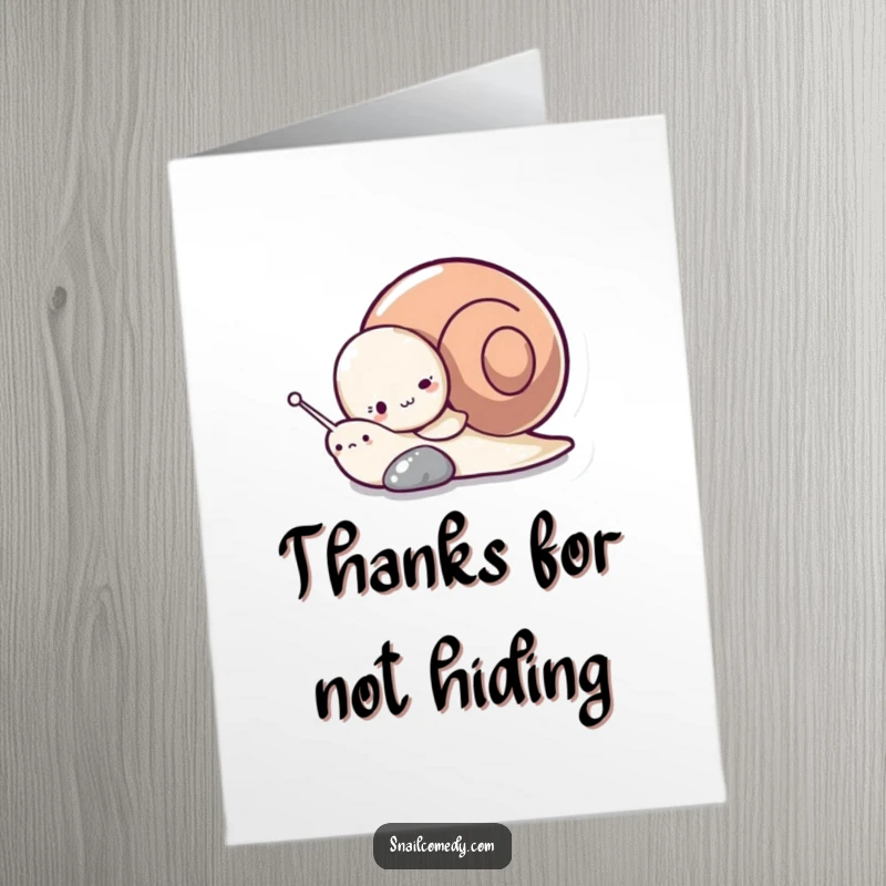 Funny Free Printable Thank You Card: Cute snail peeking from behind a pebble, offering thanks with a bashful grin.