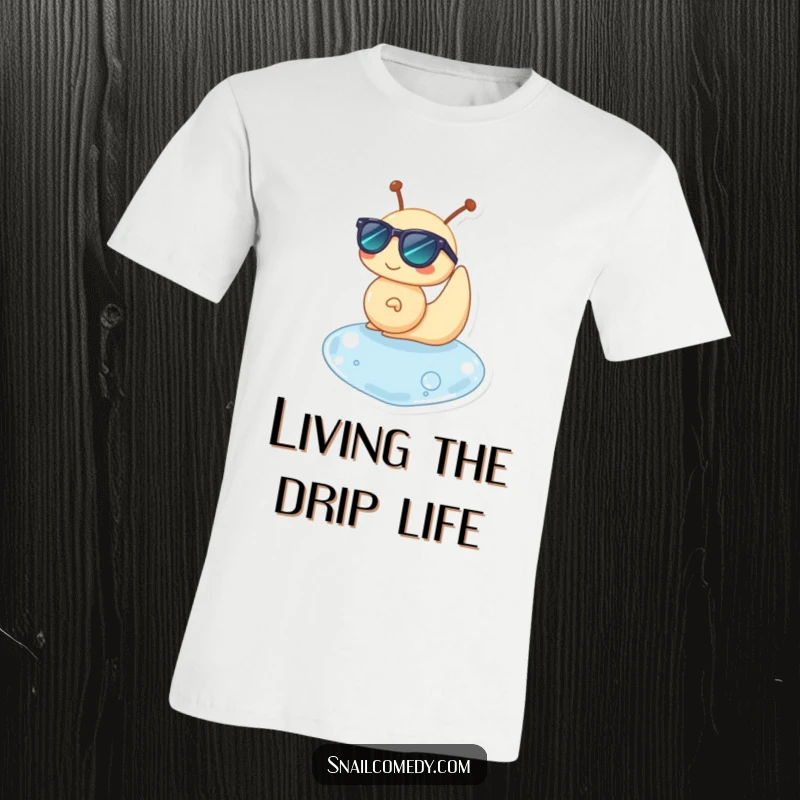 Funny t-shirt featuring a snail character in sunglasses, serenely floating on a water drop, embodying cool.